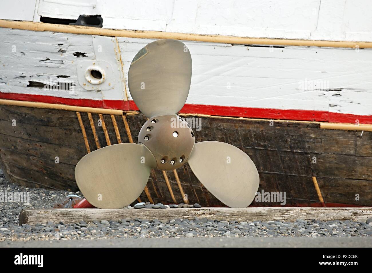 Ship propeller on shore Stock Photo