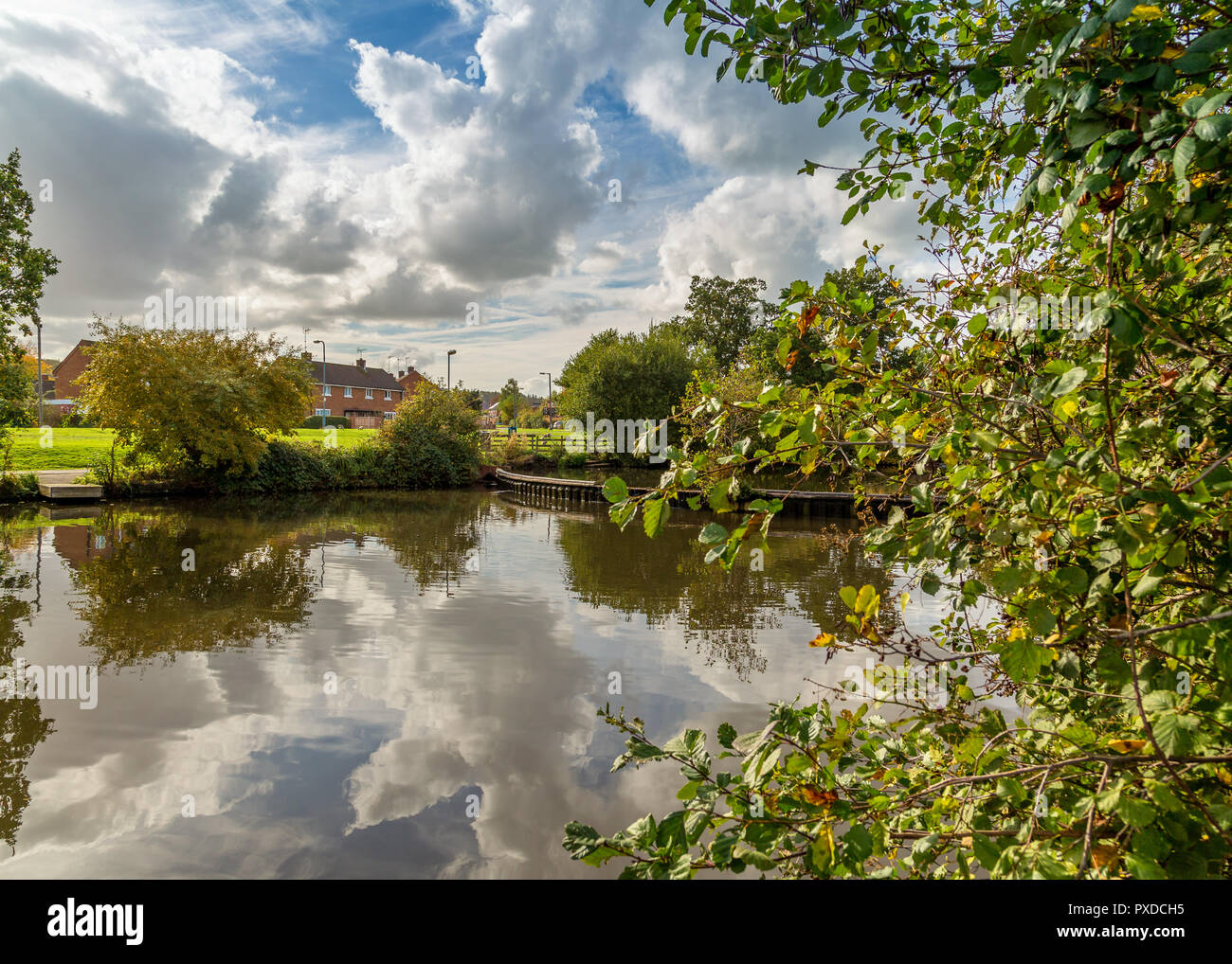 Looking out over a quiet countryside pool. Stock Photo