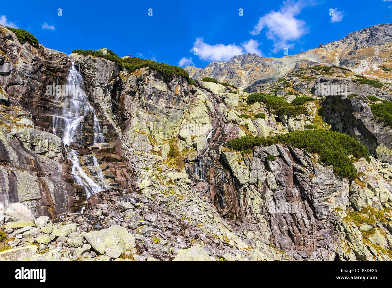Hiking in High Tatras Mountains (Vysoke Tatry), Slovakia. Skok waterfall (Slovak: Vodopad Skok). 1789m. One of the most beautiful Tatra waterfalls. Th Stock Photo