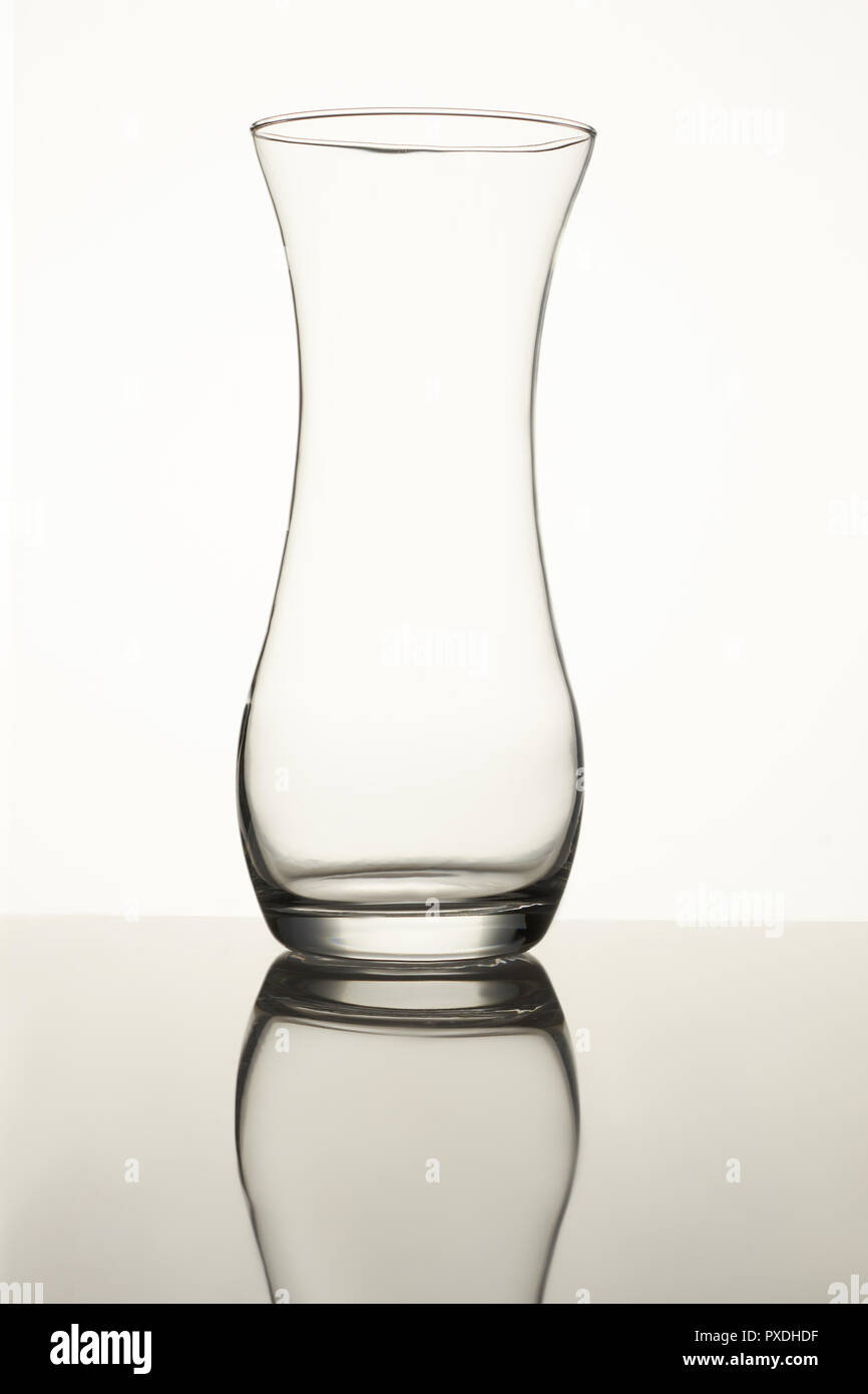 Clear glass vase isolated on a white background Stock Photo - Alamy