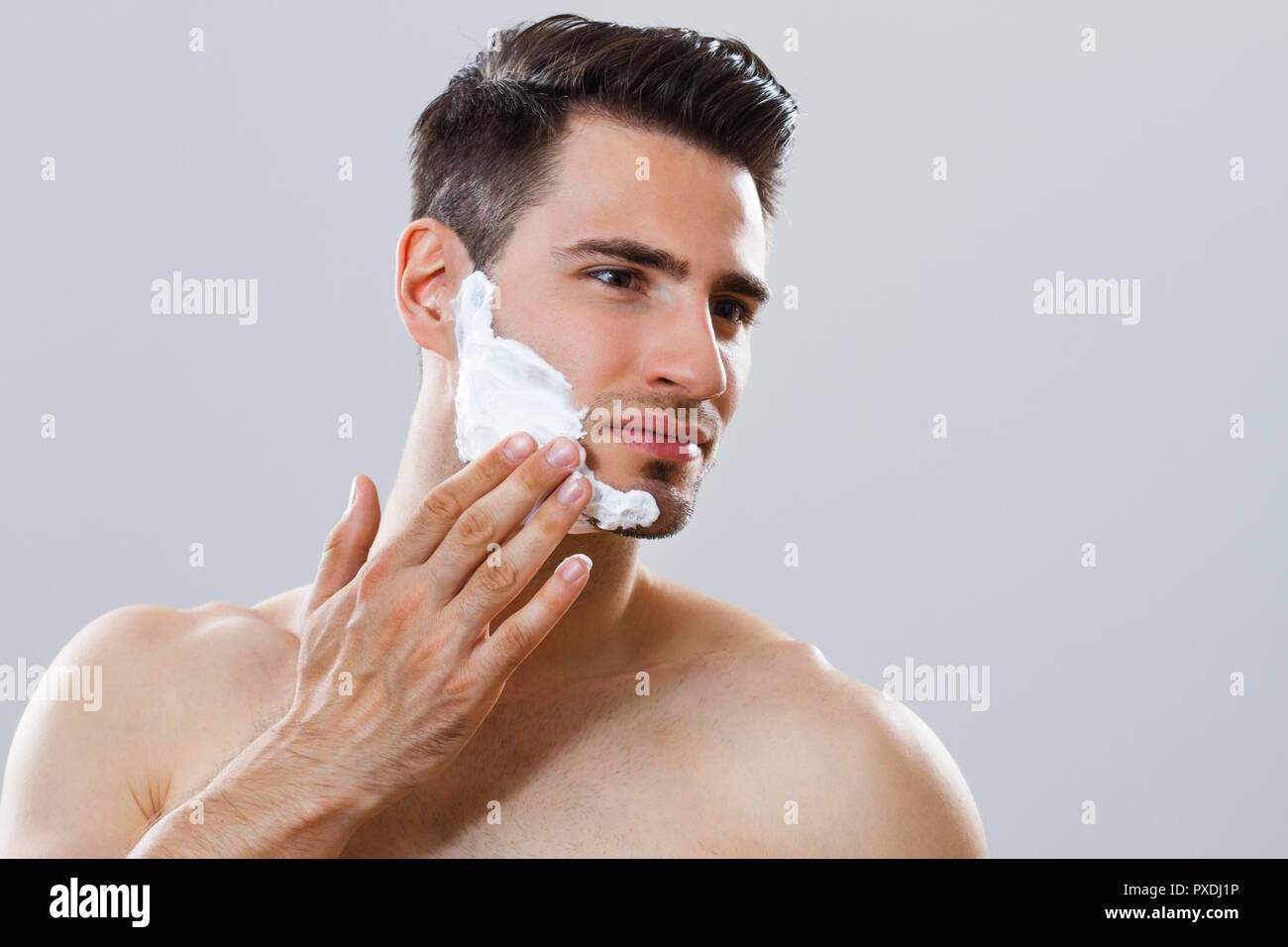 Man applying shaving cream Stock Photo Alamy