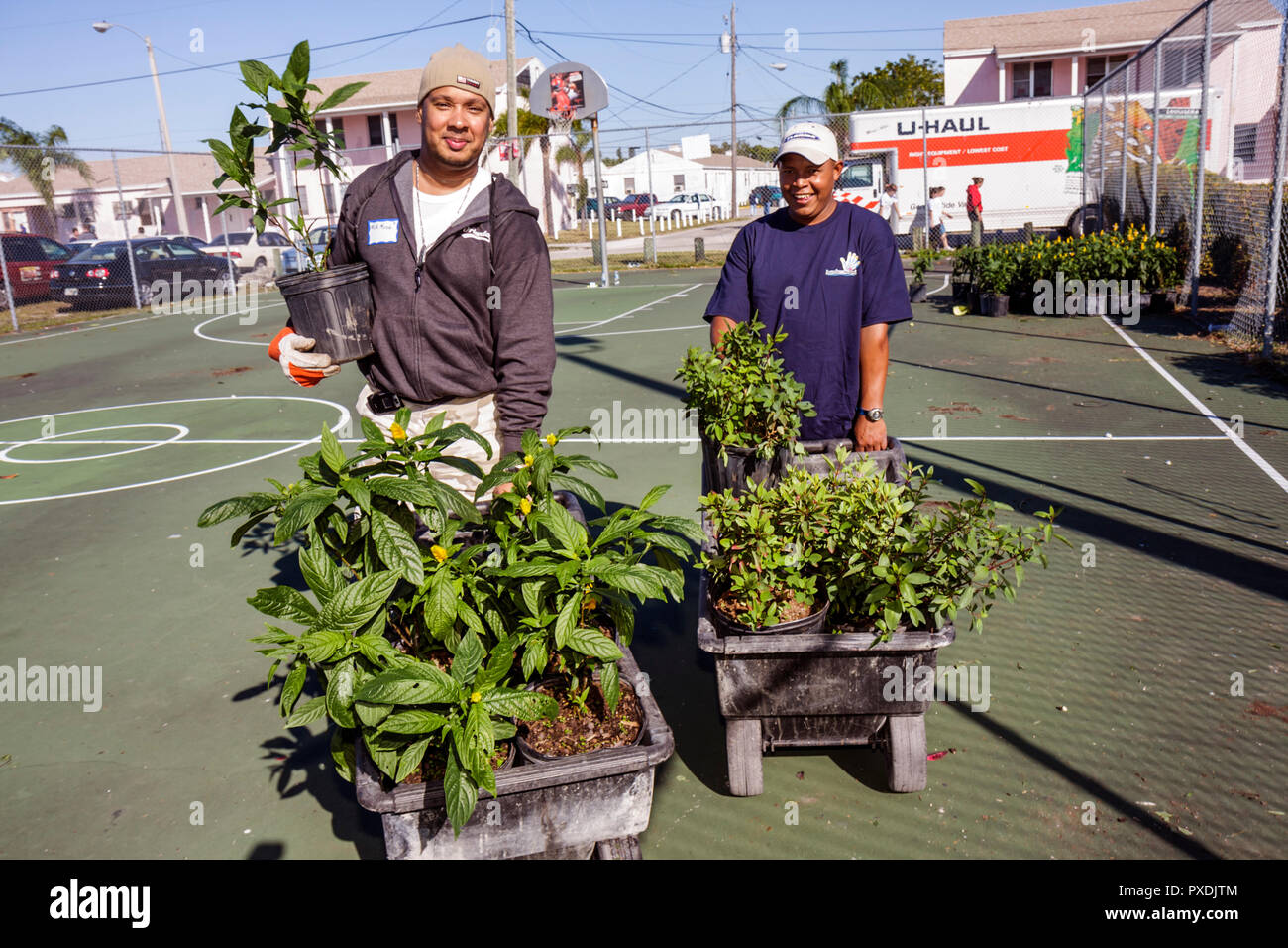 Miami Florida,Liberty City,Square,public housing,neighborhood,Hands On HandsOn Miami,volunteer volunteers volunteering work worker workers,working tog Stock Photo