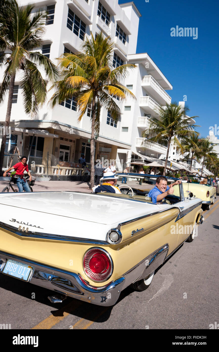 Miami Beach Florida,Ocean Drive,Art Deco Weekend,architecture,architectural,festival,event,celebration,parade,crowd,classic car cars,Ford Fairlane,con Stock Photo