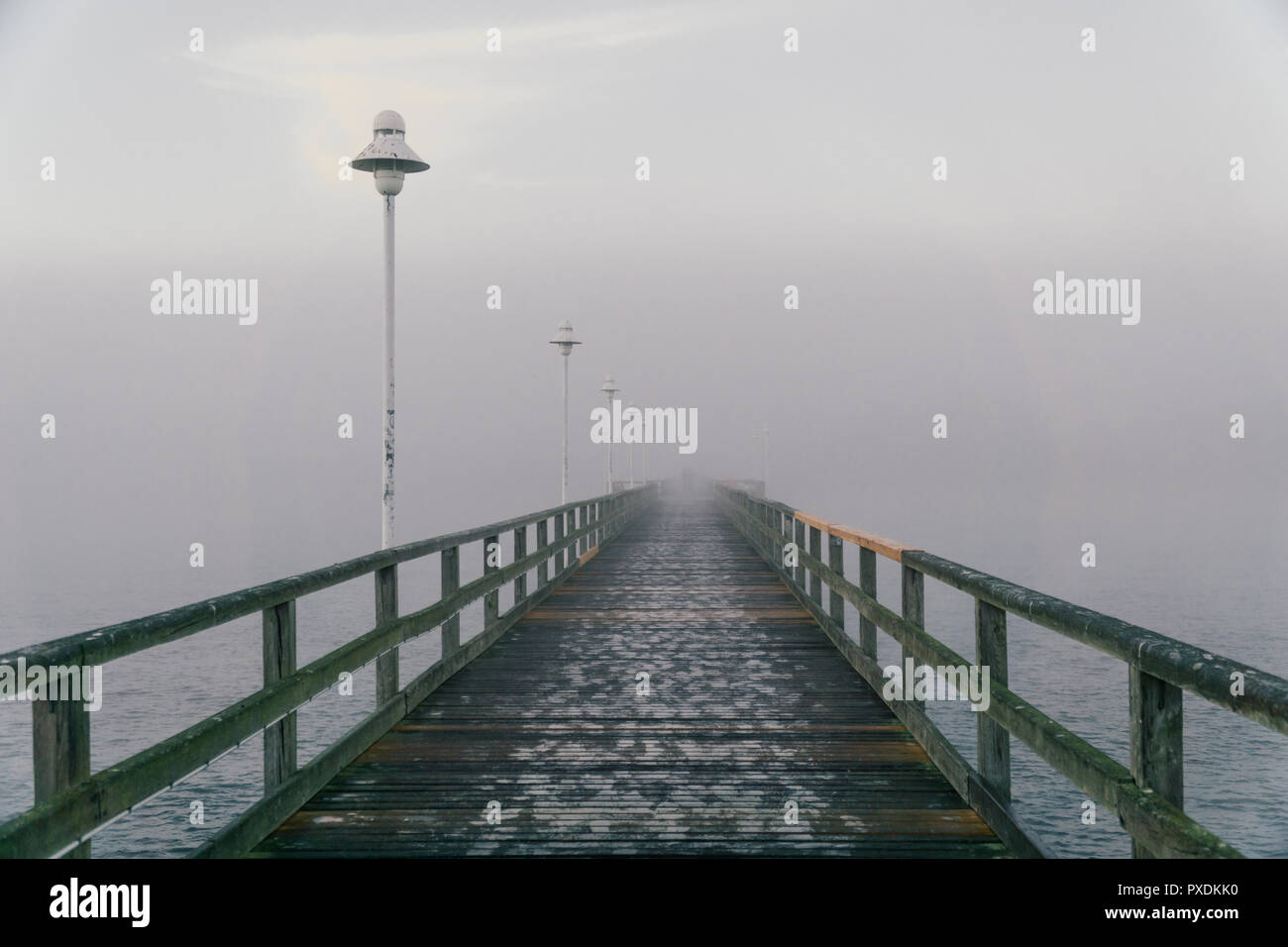 Bridge in the fog hi-res stock photography and images - Alamy