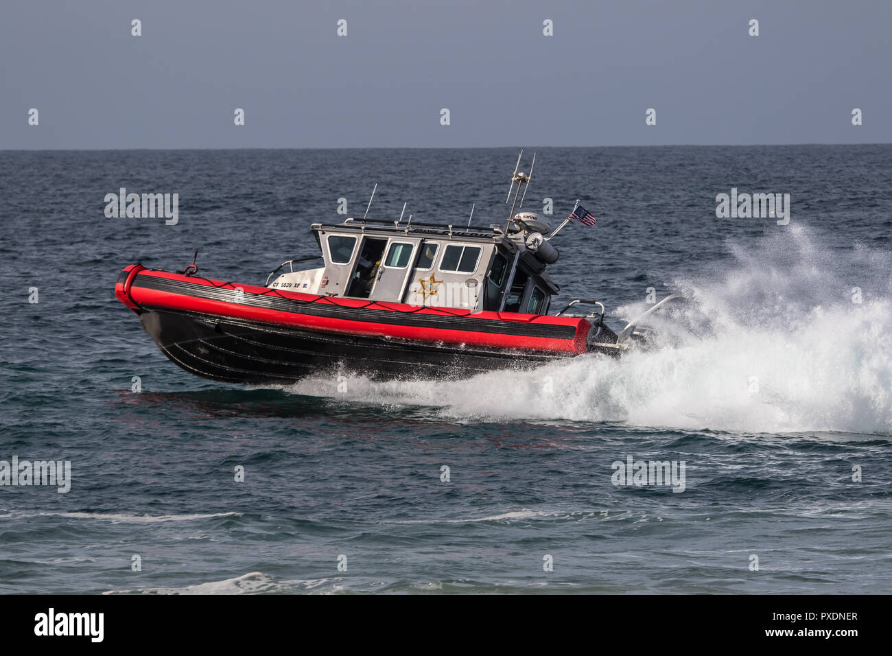 Orange County Sheriff departments marine patrol boat patrolling the coastal waters off Southern California Stock Photo