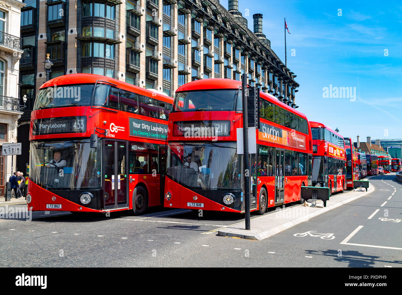 London, England, UK. Double-decker tourist sightseeing bus in Parliament Square Stock Photo