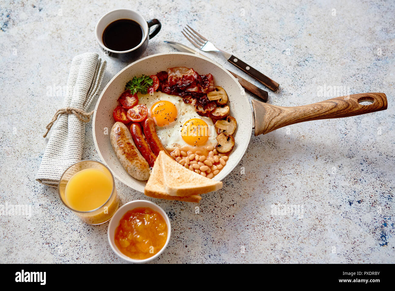 Traditional Full English Breakfast on frying pan. Stock Photo