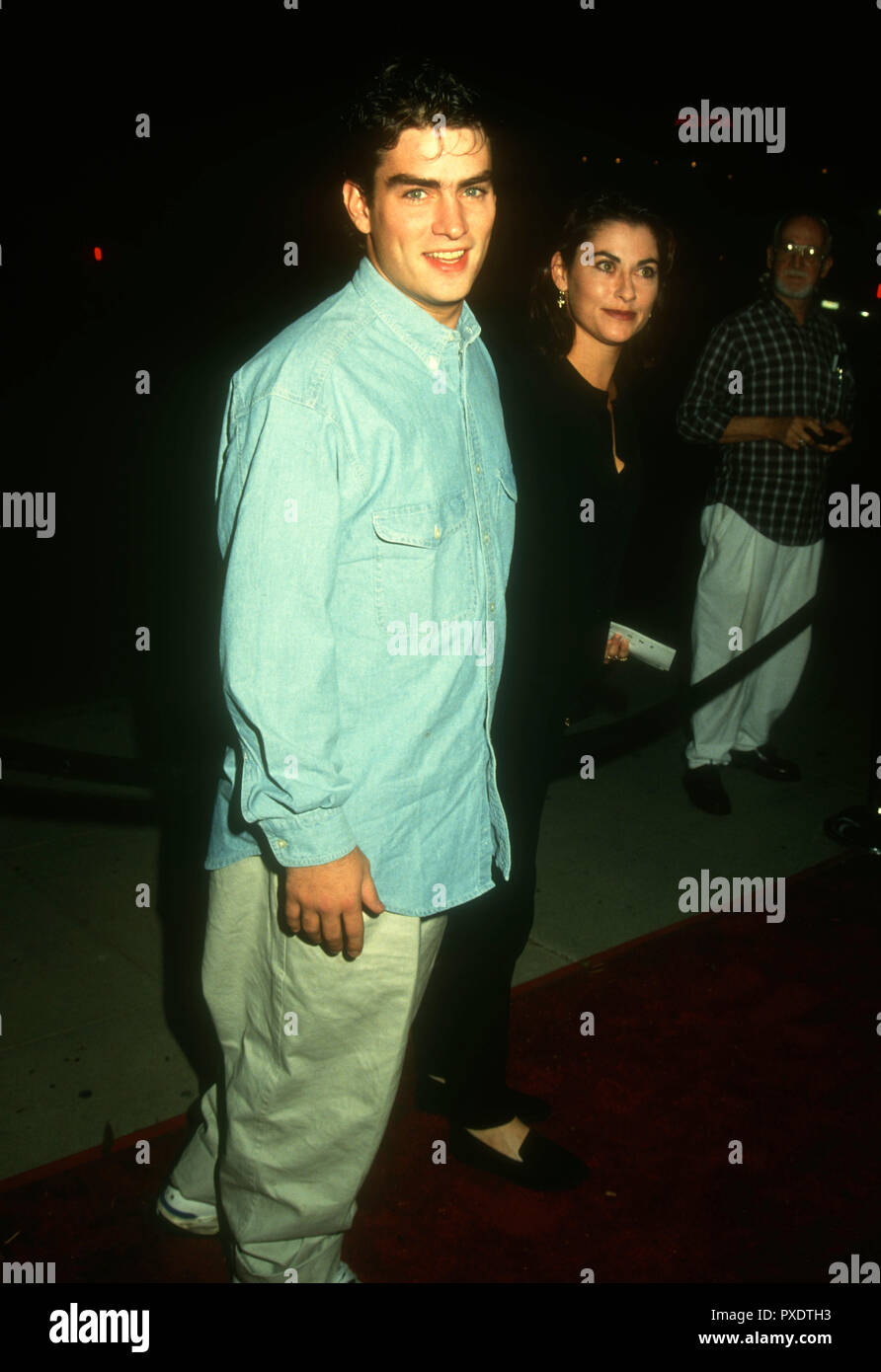 BEVERLY HILLS, CA - NOVEMBER 2: Actor Rodney Harvey and actress Roxana Zal attend 'Jennifer 8' Premiere on November 2, 1992 at the Academy Theatre in Beverly Hills, California. Photo by Barry King/Alamy Stock Photo Stock Photo
