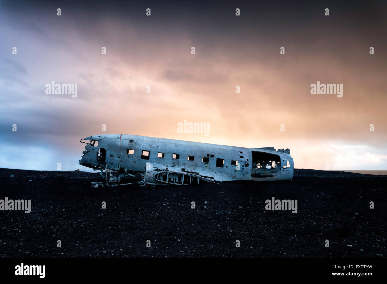 Sólheimasandur, Iceland: The wrecked hull of a United States Navy Douglas Super DC-3 airplane is all that remains from a crash that happened in 1973. Stock Photo