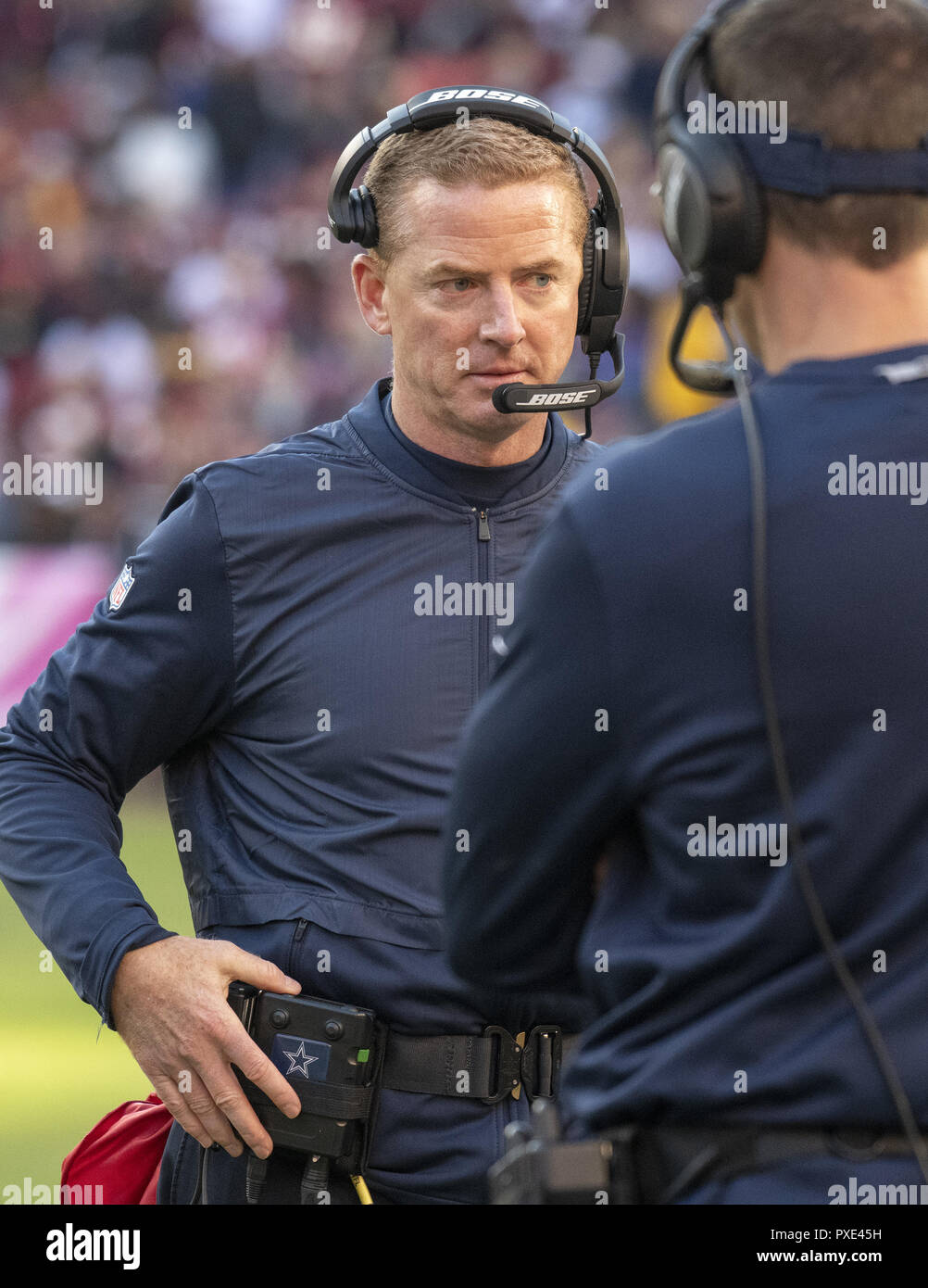 Landover, Maryland, USA. 21st Oct, 2018. Dallas Cowboys head coach Jason Garrett speaks with an assistant coach during a break in the second quarter action against the Washington Redskins at FedEx Field in Landover, Maryland on Sunday, October 21, 2018 Credit: Ron Sachs/CNP/ZUMA Wire/Alamy Live News Stock Photo