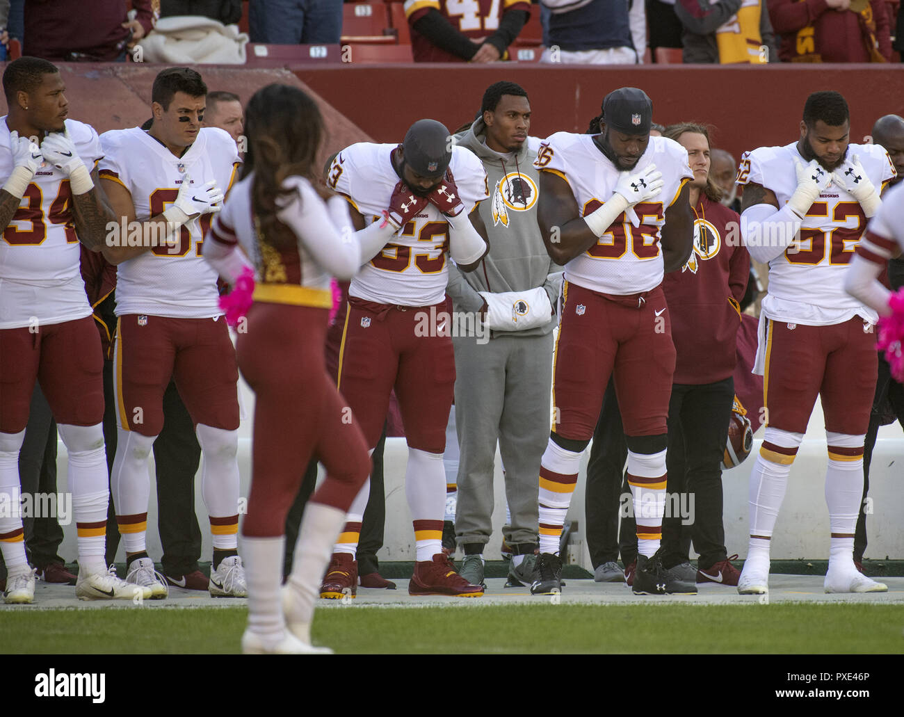 Landover, Maryland, USA. 21st Oct, 2018. Washington Redskins linebacker Preston Smith (94), linebacker Ryan Kerrigan (91), linebacker Zach Brown (53), linebacker Pernell McPhee (96) and linebacker Ryan Anderson (52) stand as the National Anthem is sung prior to the game against the Dallas Cowboys at FedEx Field in Landover, Maryland on Sunday, October 21, 2018 Credit: Ron Sachs/CNP/ZUMA Wire/Alamy Live News Stock Photo
