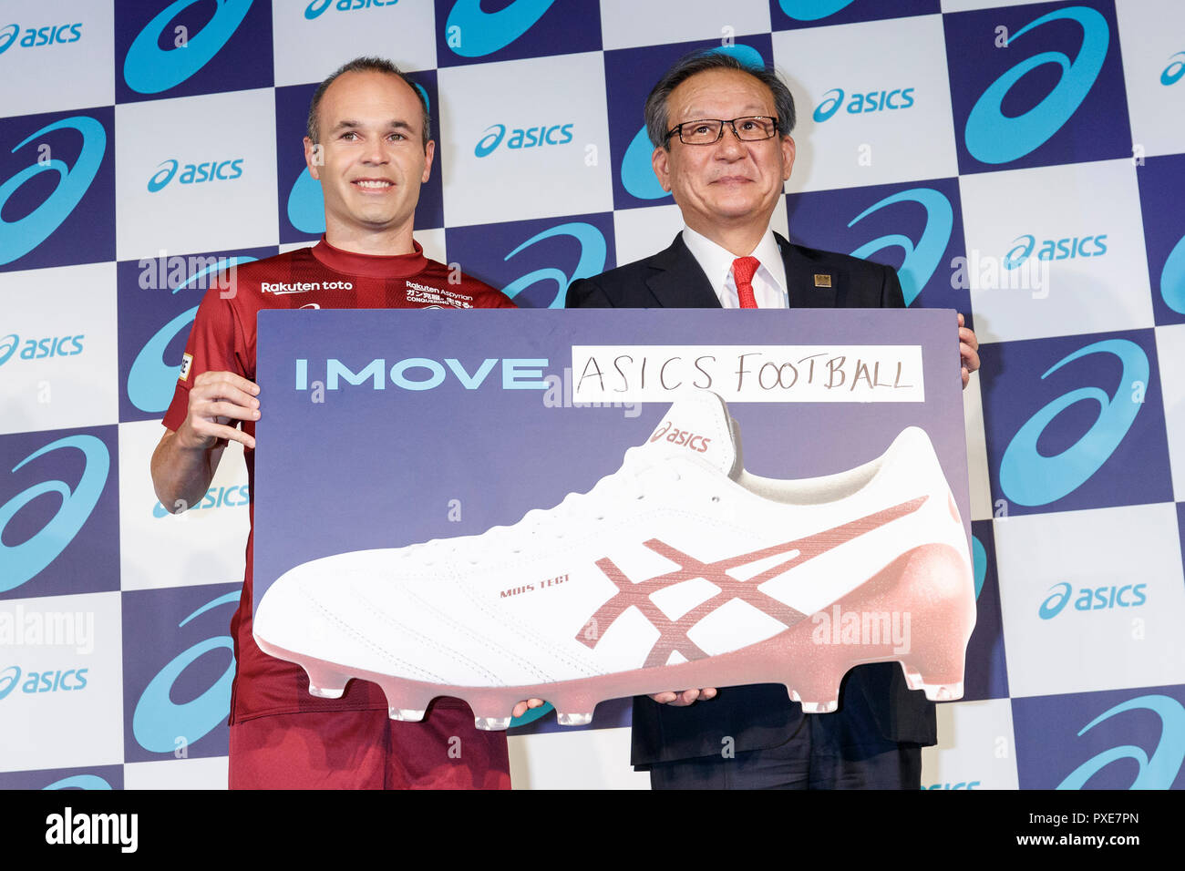 L to R) Andres Iniesta of Vissel Kobe and Motoi Oyama CEO of ASICS pose for  the cameras, during a news conference on October 22, 2018, Tokyo, Japan.  The former Barcelona and
