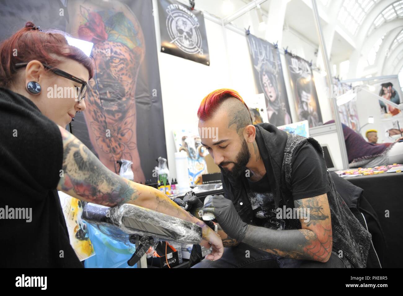 Brno, Czech Republic. 20th Oct, 2018. The second year of the Tattoo Grand Prix festival starts in Brno, Czech Republic, on October 20, 2018. The interest of visitors is great, dozens of people leave the event with a new tattoo. Credit: Igor Zehl/CTK Photo/Alamy Live News Stock Photo