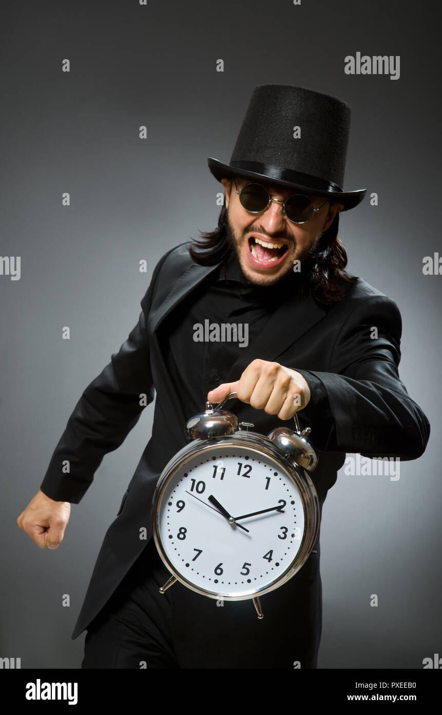 Vintage concept with man wearing black top hat Stock Photo - Alamy