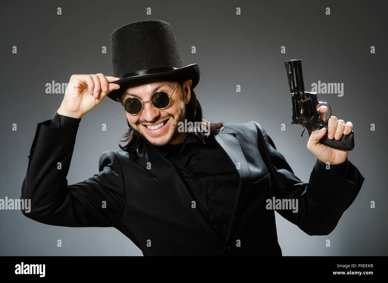 Vintage concept with man wearing black top hat Stock Photo - Alamy