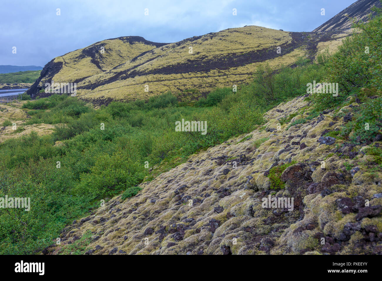 Lava lunar landscape on the climb to Grabrok Crater in Iceland Stock Photo