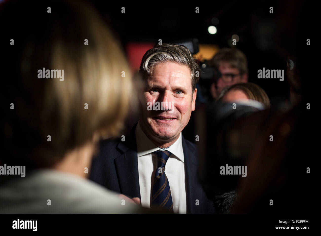 © Chris Bull. 26/9/18   LIVERPOOL   , UK.   The Labour Party Conference today (WEDNESDAY 26th Septeber 2018).  Shadow Secretary of State for Exiting the European Union Keir Starmer MP is questioned by journalists as he leaves the conference hall follwing Leader of the Labour Party Jeremy Corbyn's speech. There have been calls for him to clarify Labour's Brexit policy after his speech contradicted some of what John McDonnell has said.    Photo credit: CHRIS BULL Stock Photo