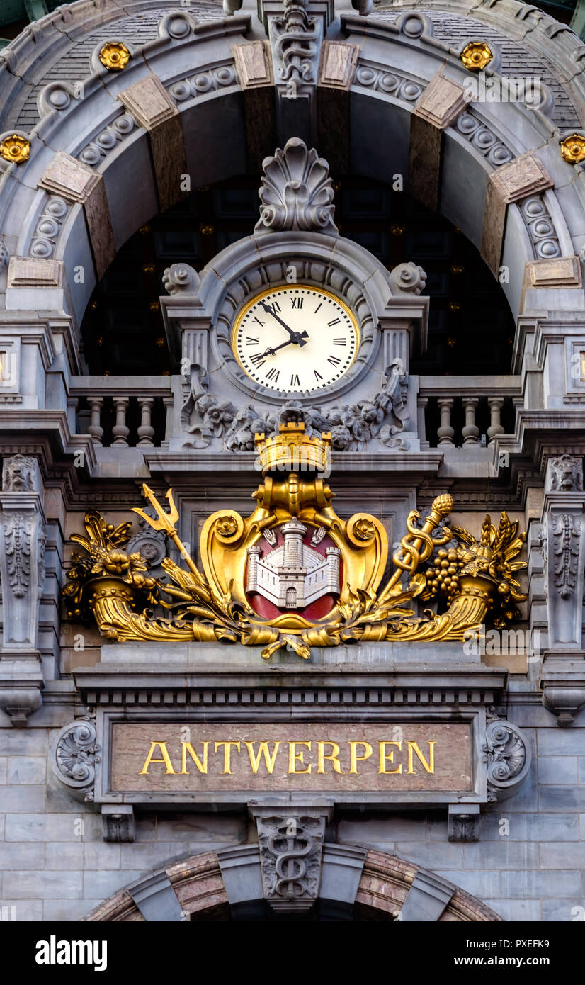 Clock at the upper level of the Central Station in Antwerp. The original building was designed by Clement Van Bogaert and was constructed between 1895 Stock Photo