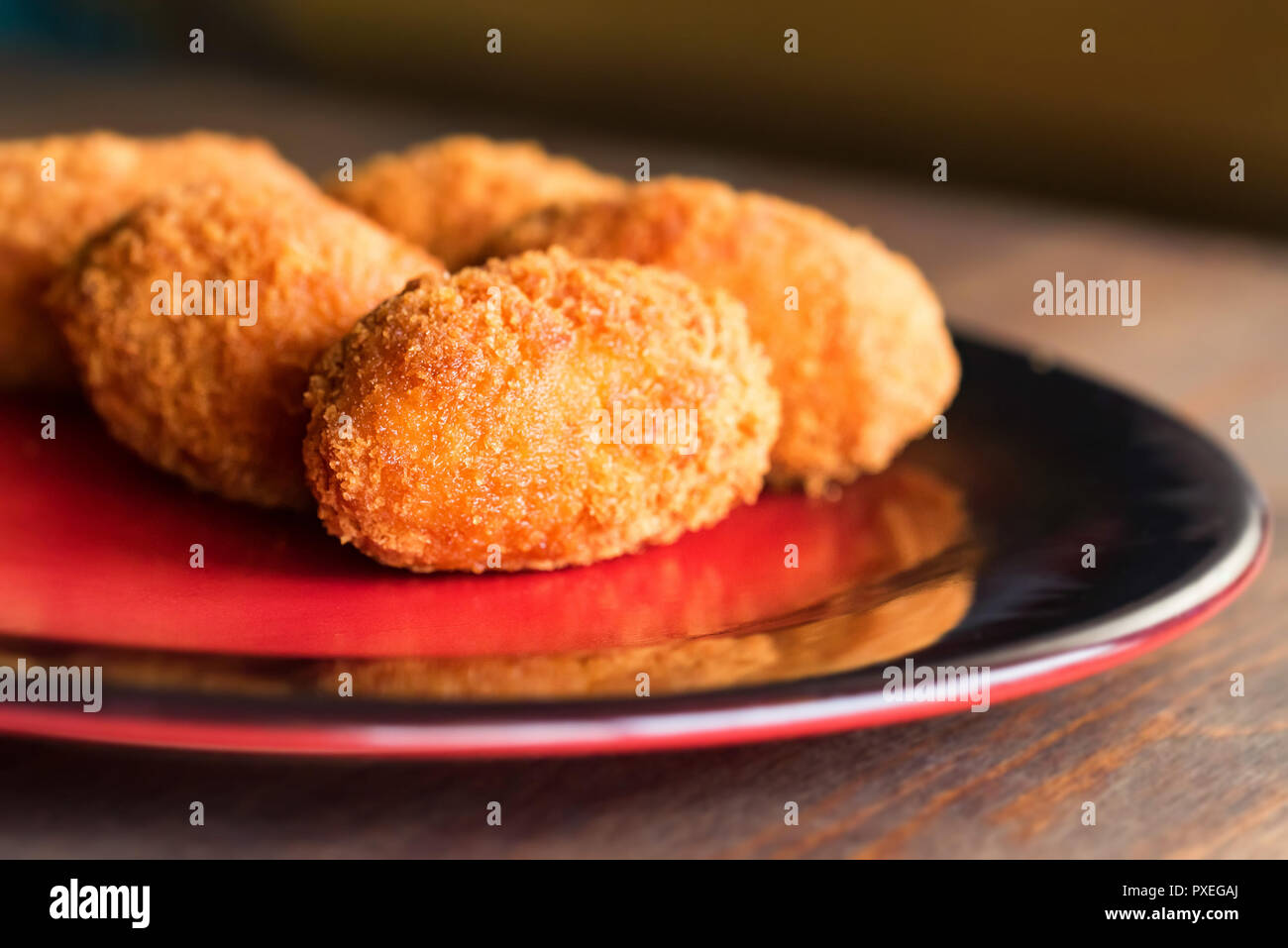 Freshly cooked breaded meat cutlets on plate Stock Photo