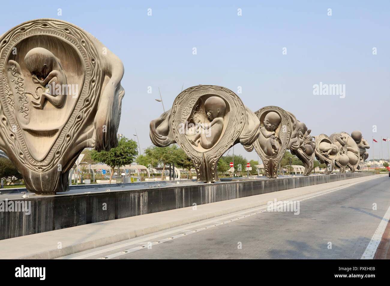 Doha / Qatar – October 9, 2018: Part of The Miraculous Journey, an art installation by artist Damien Hirst outside Sidra Medicine, Doha. Stock Photo