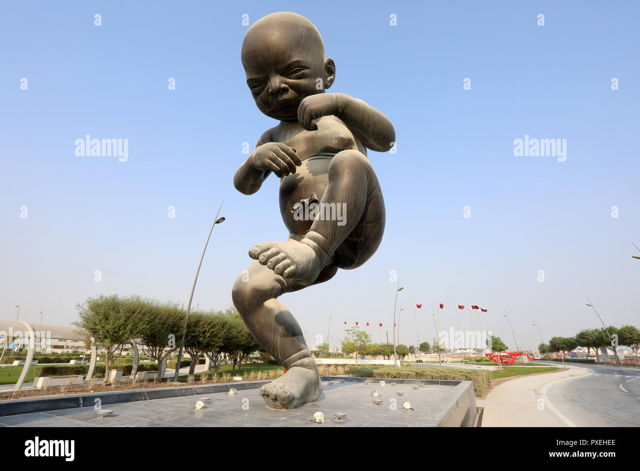 Doha / Qatar – October 9, 2018: Part of The Miraculous Journey, an art installation by artist Damien Hirst outside Sidra Medicine, Doha. Stock Photo