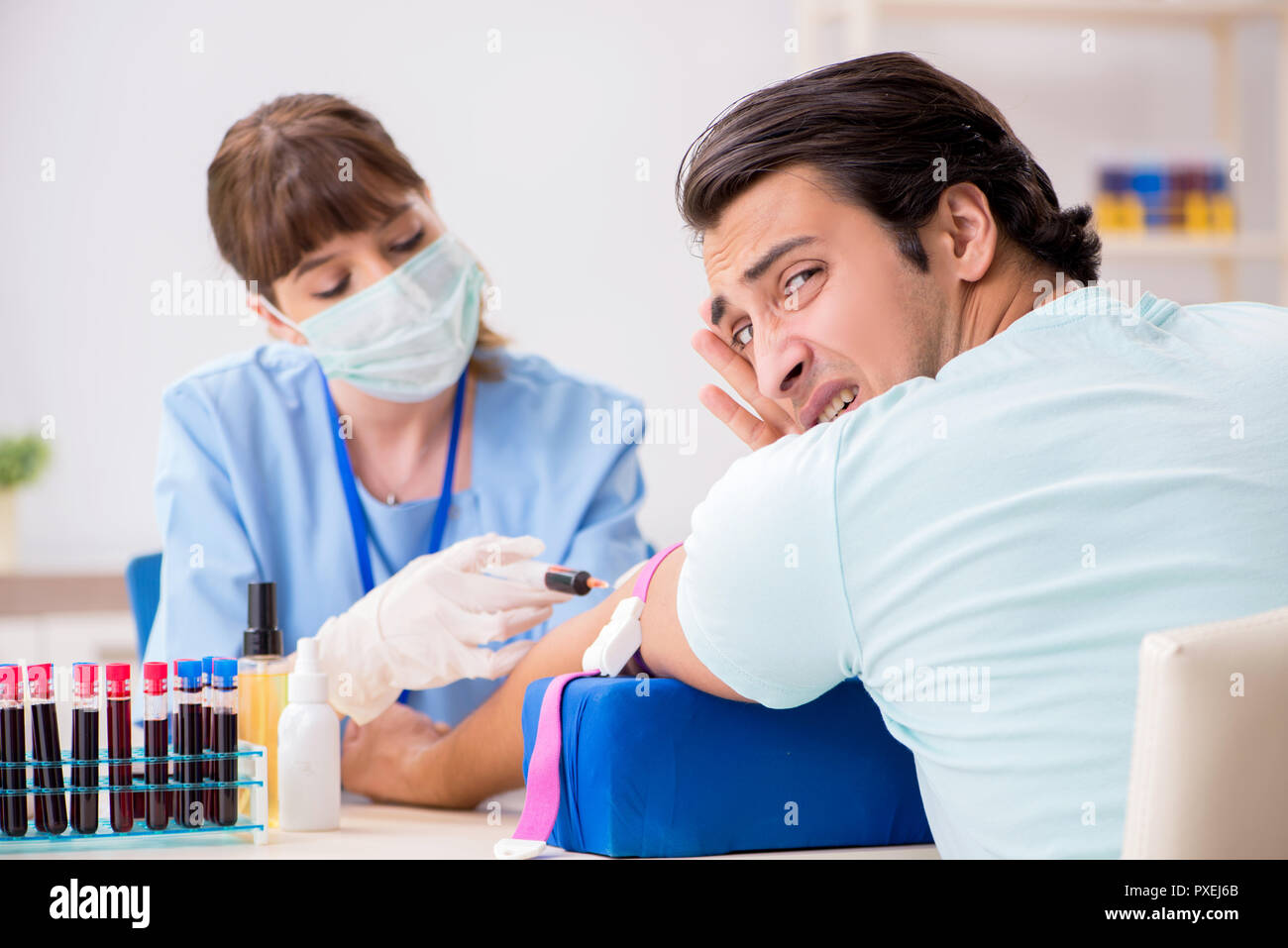 Young patient during blood test sampling procedure Stock Photo - Alamy
