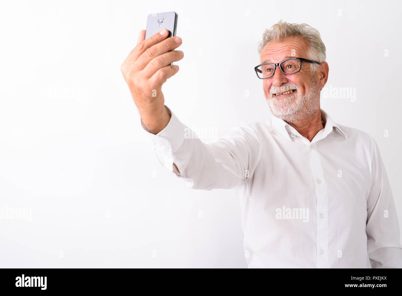 Senior man taking happy selfie hi-res stock photography and images - Alamy