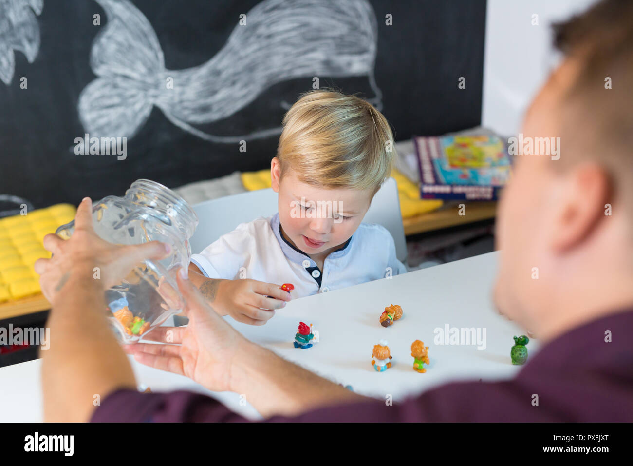 Cute little toddler boy at child therapy session. Stock Photo