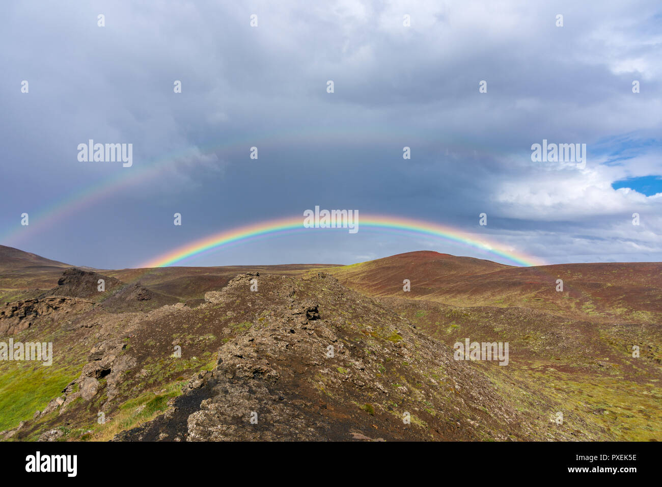 Rainbow near  Hafragilsfoss Waterfall and canyon in the Jokulsargljufur National Park in North Iceland Stock Photo