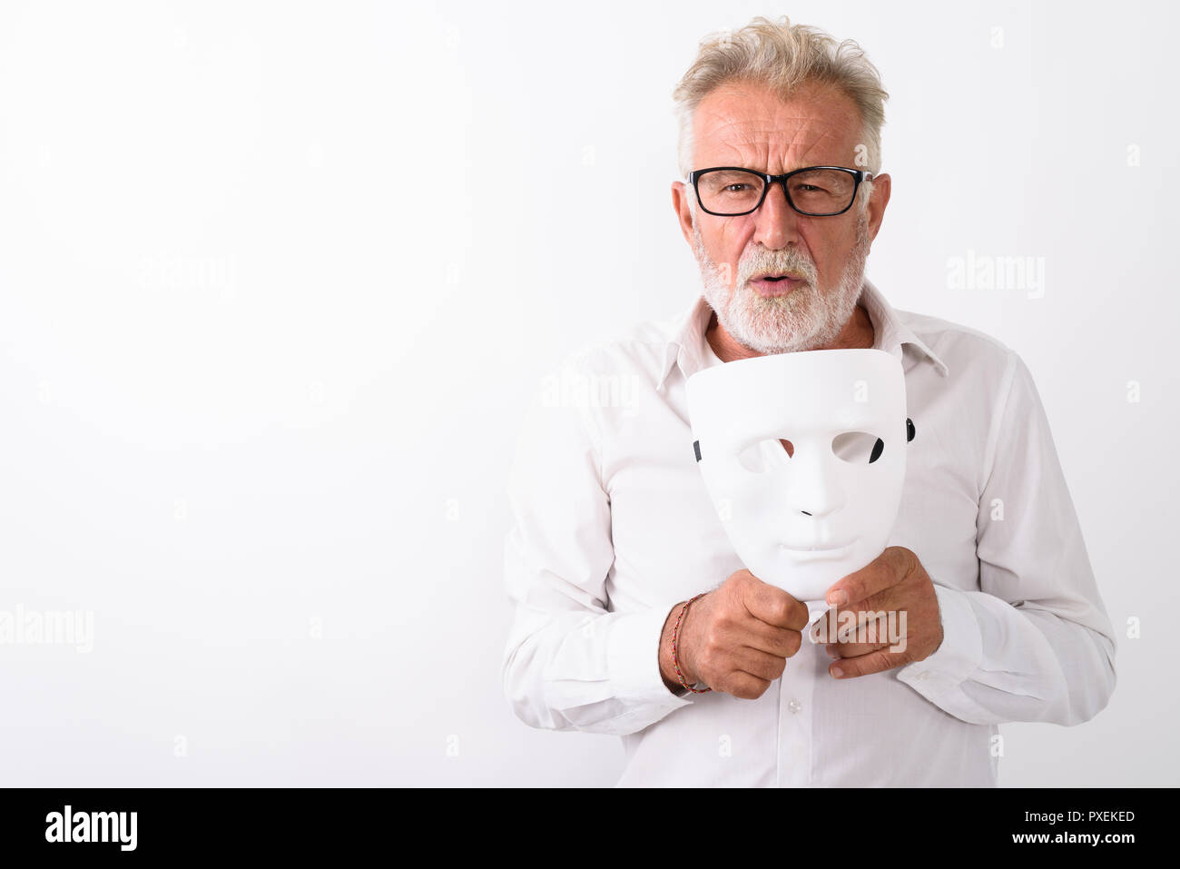Man holding mask face hi-res stock photography and images - Alamy