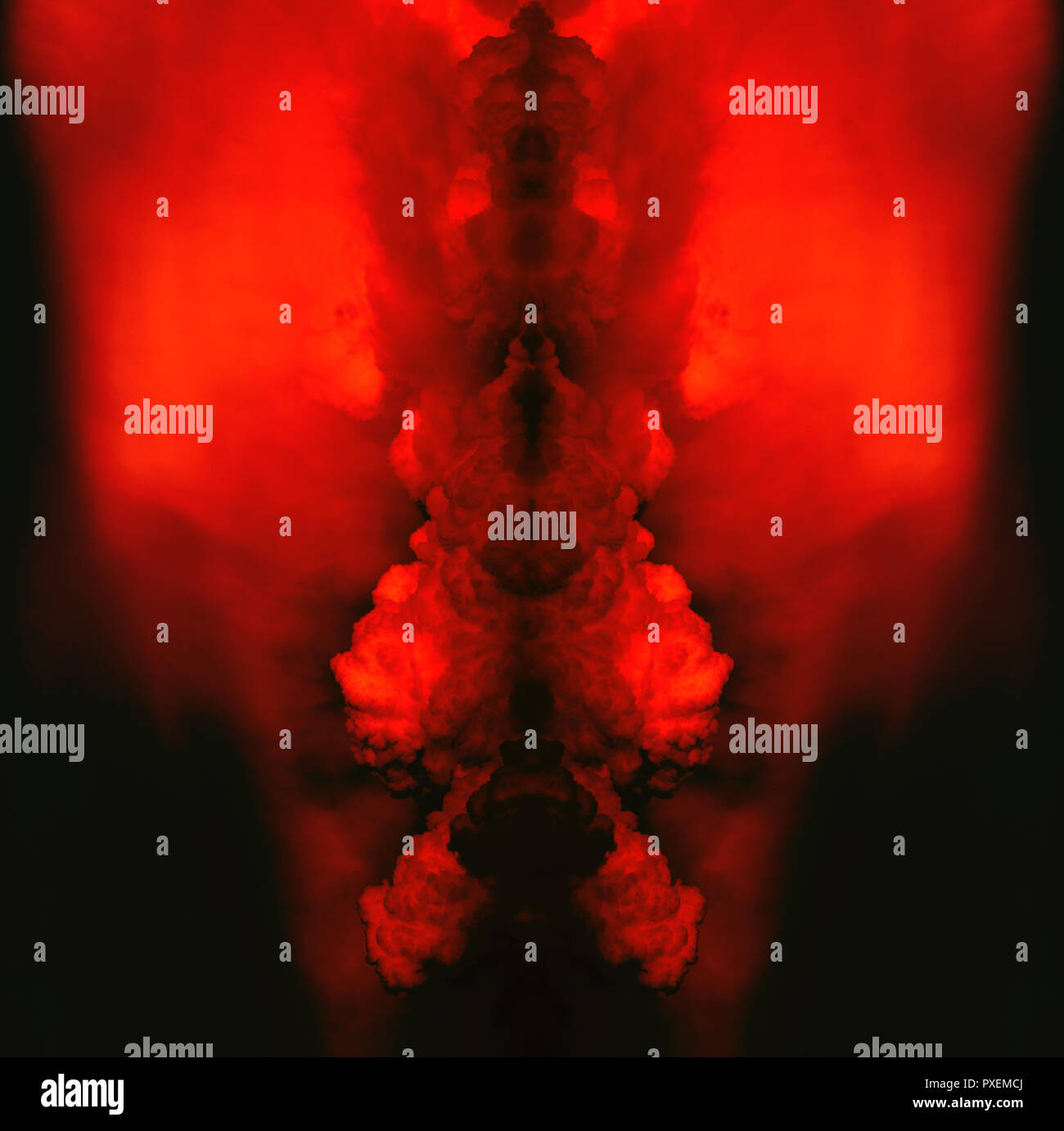Abstract symmetrical Hell like colored Cumulus Type clouds. Stock Photo