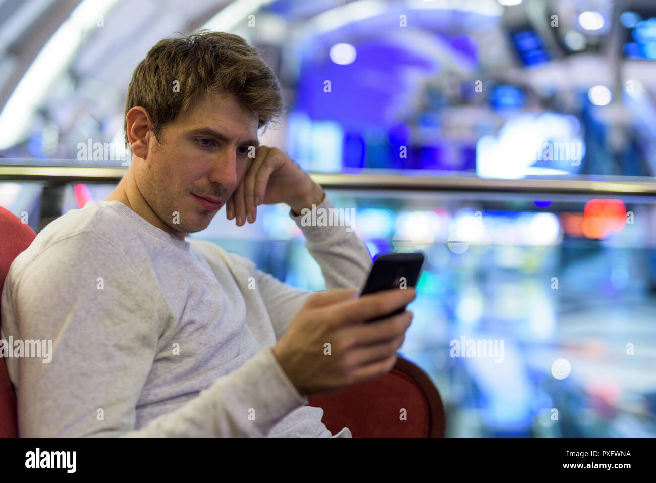 Man sitting hand holding hi-res stock photography and images - Alamy