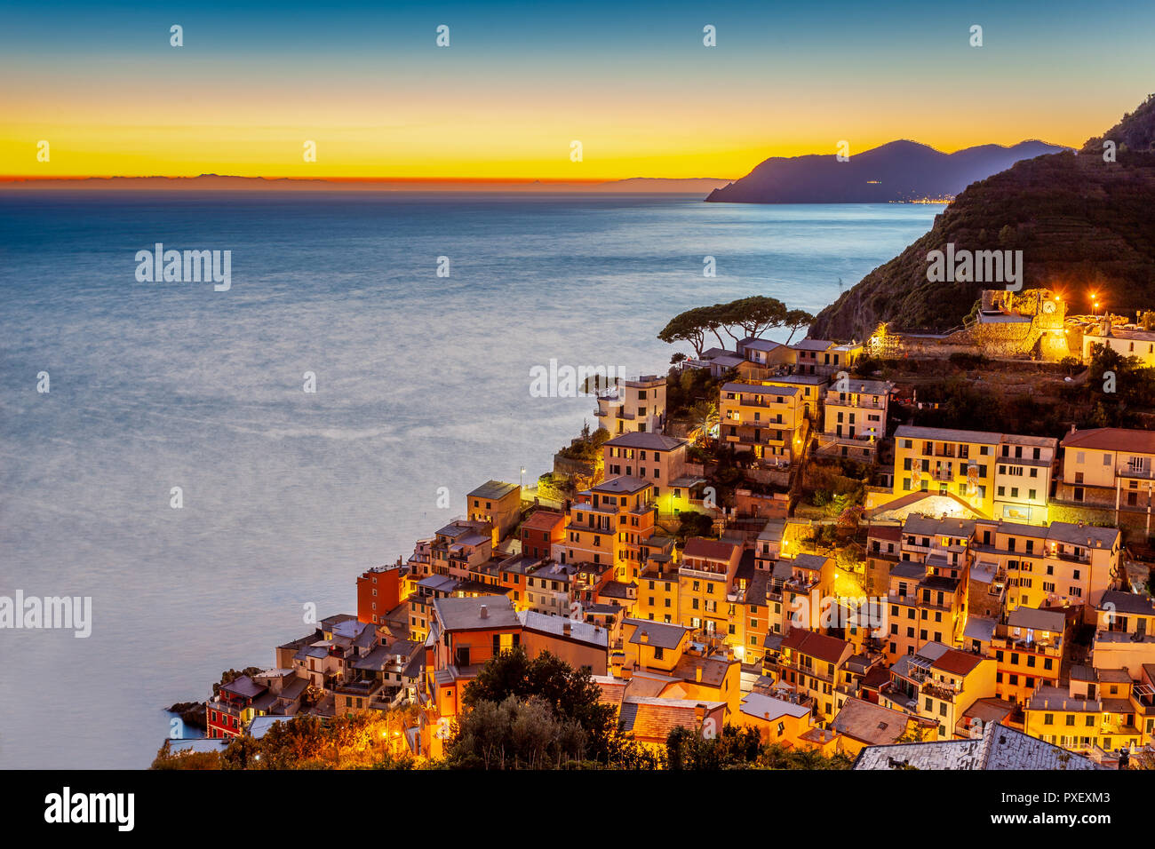 Riomaggiore fisherman village at sunset (Cinque Terre, Italy) Stock Photo