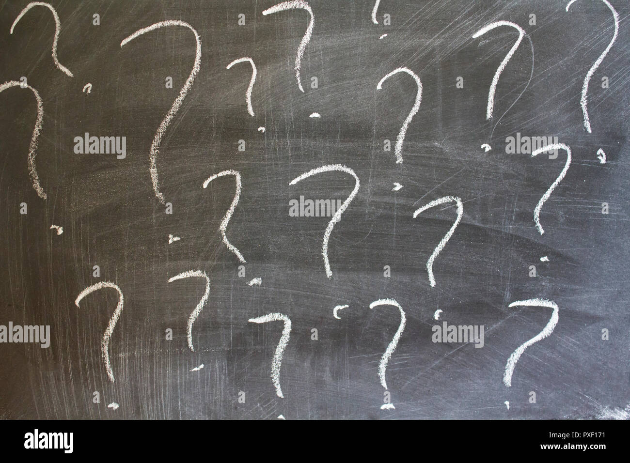 Question marks written on chalkboard Stock Photo Alamy