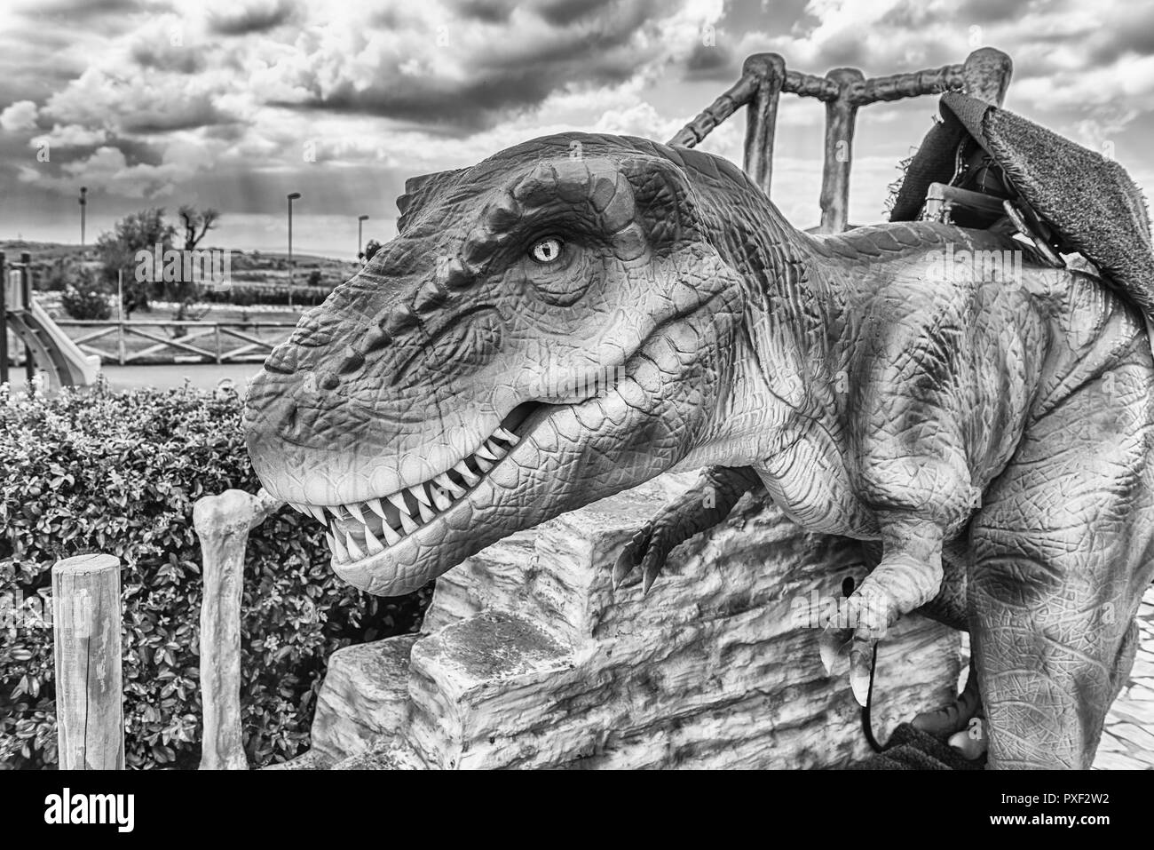 SAN MARCO IN LAMIS, ITALY - JUNE 9: Tyrannosaurus Rex dinosaur, aka t-rex, featured in the Dino Park in San Marco in Lamis, small town in southern Ita Stock Photo