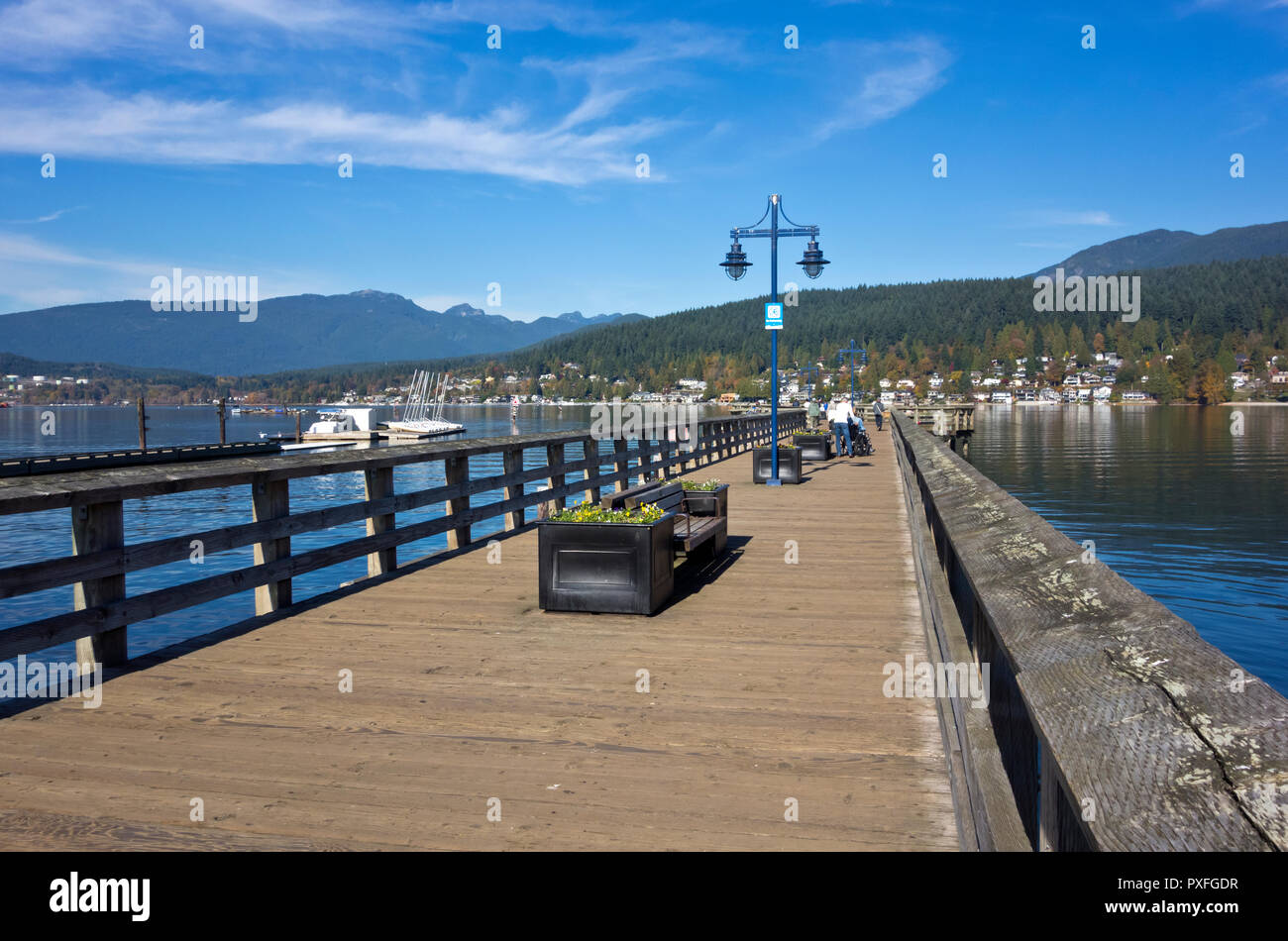 Pier at Rocky Point Park in Port Moody, BC, Canada. Port Moody, British Columbia. Waters of Burrard Inlet. Stock Photo