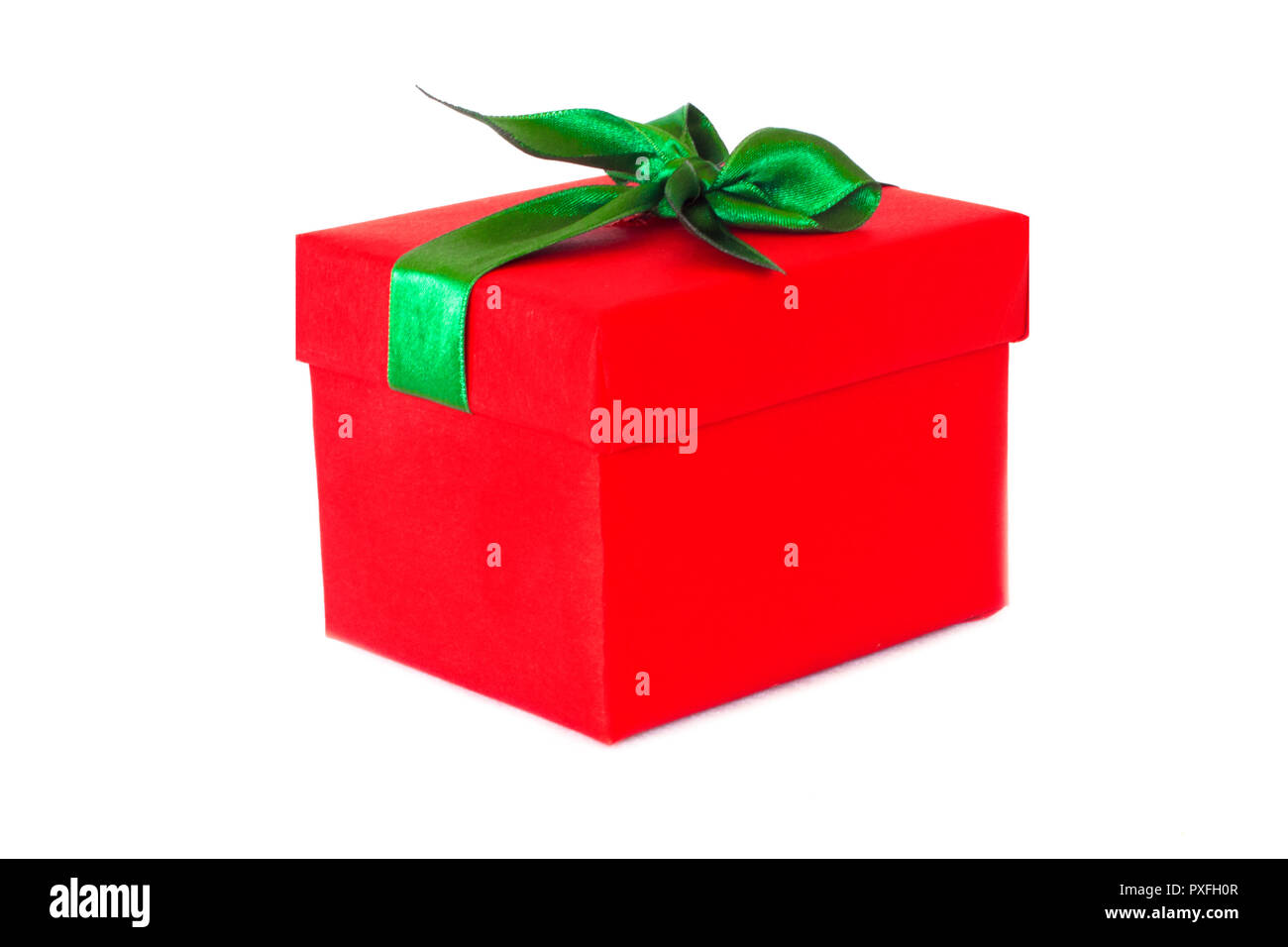 Red gift box with the green satin ribbon bow Stock Photo - Alamy