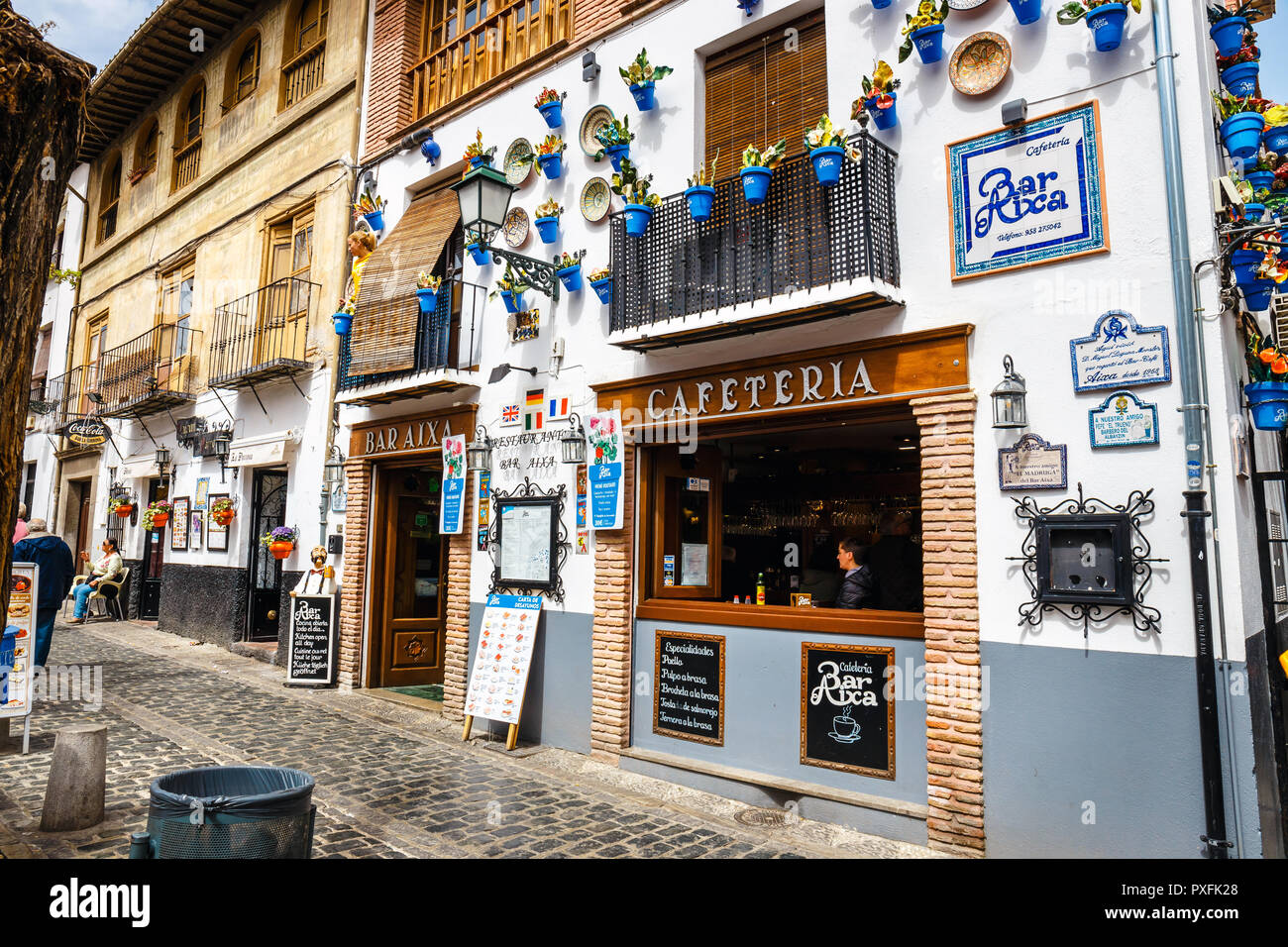 Granada, Spain, April 06, 2018: Street view of the historic district of Albaicin in Granada, Andalusia, Spain Stock Photo