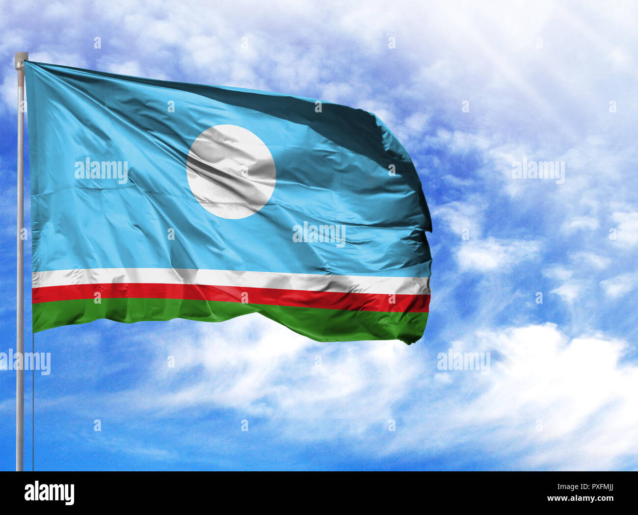 National Flag Of Sakha Republic On A Flagpole In Front Of Blue Sky Stock Photo Alamy