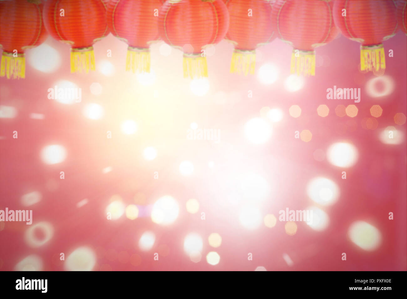 Red lanterns hanging over blur lights background. Chinese New Year ...