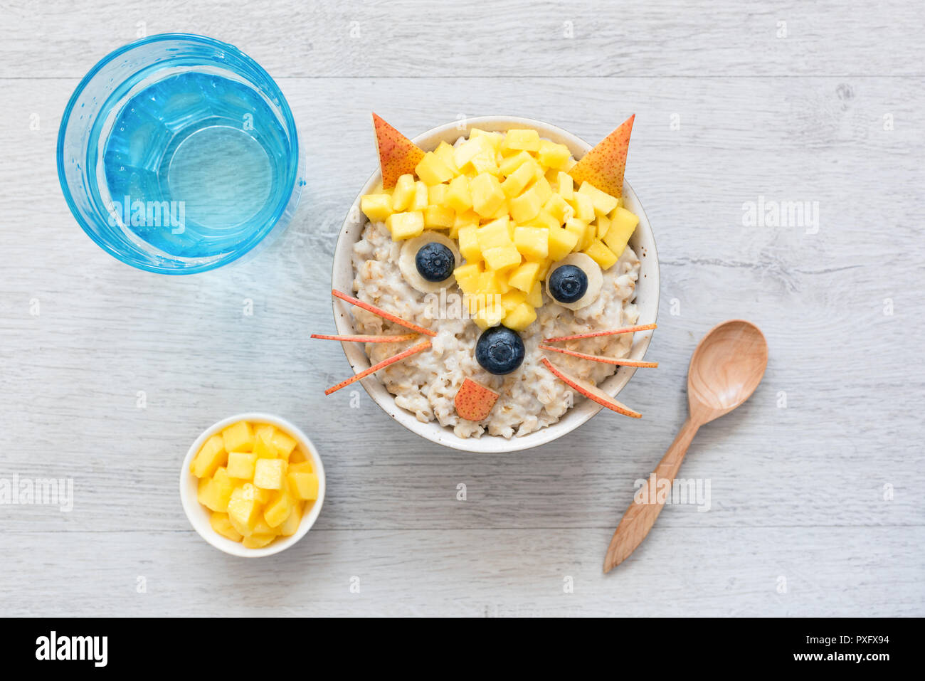 Healthy Funny Cute Breakfast For Kids. Oatmeal Porridge Decorated As Fox With Fruits Berries. Food Art. Creative Food Idea For Children Stock Photo