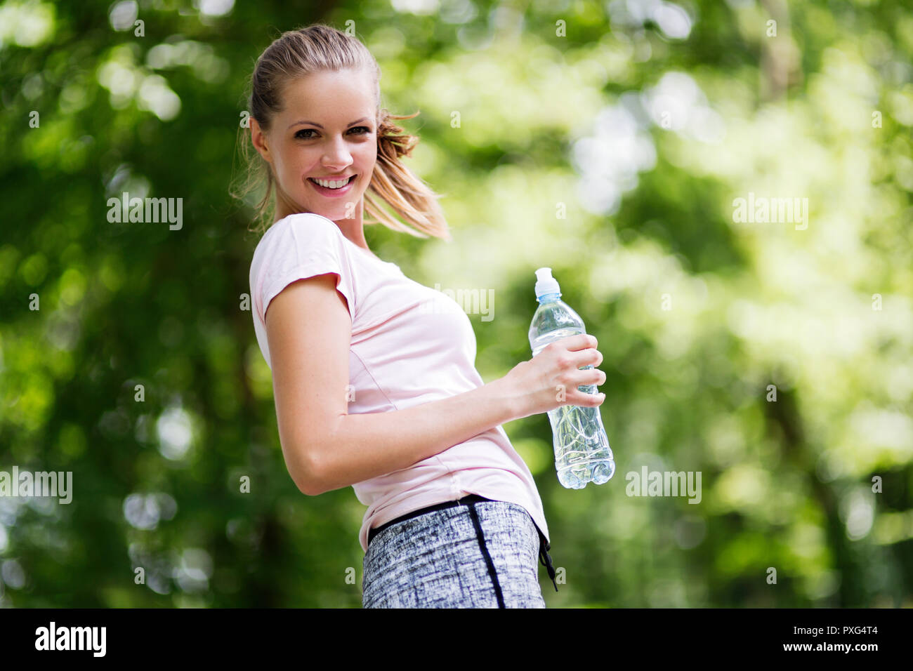 Beautiful female jogger Stock Photo