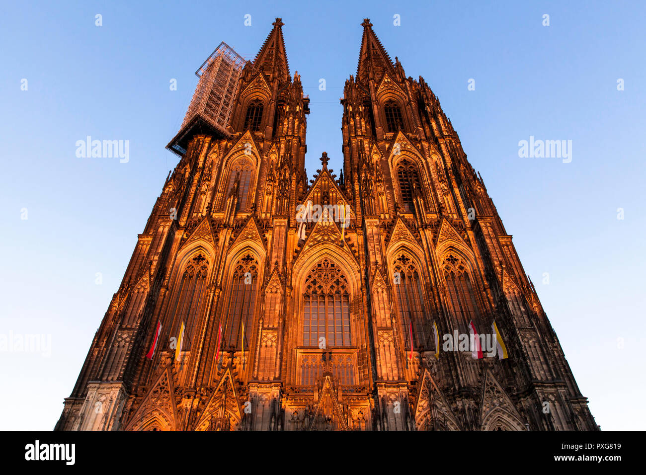 the west facade of the cathedral, scaffolding at the nothern tower, Cologne, Germany.  die Westfassade des Doms, Geruest am Nordturm, Koeln, Deutschla Stock Photo