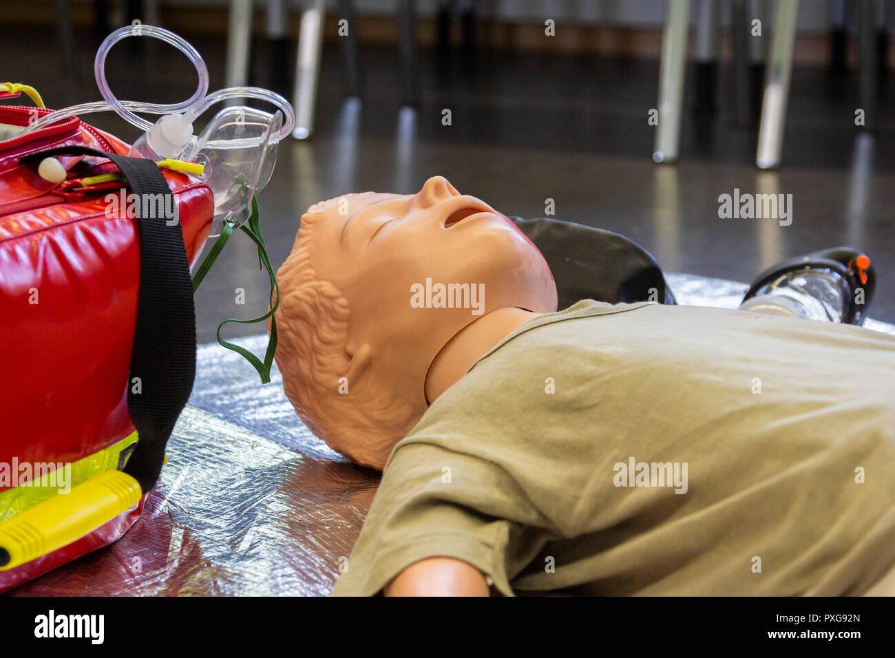 Medical teenager puppet lies injured on the ground Stock Photo - Alamy
