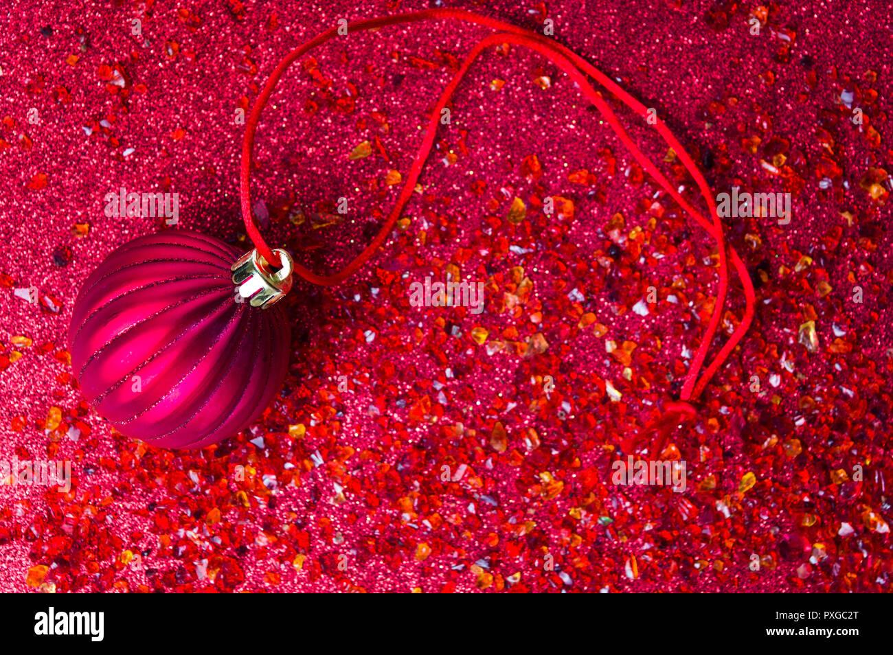 Red Christmas decoration on festive background close up Stock Photo