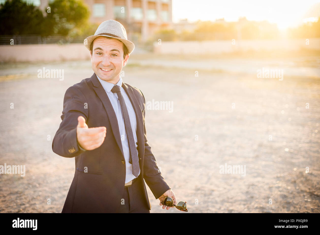 Attractive man suit sunglasses hi-res stock photography and images - Alamy