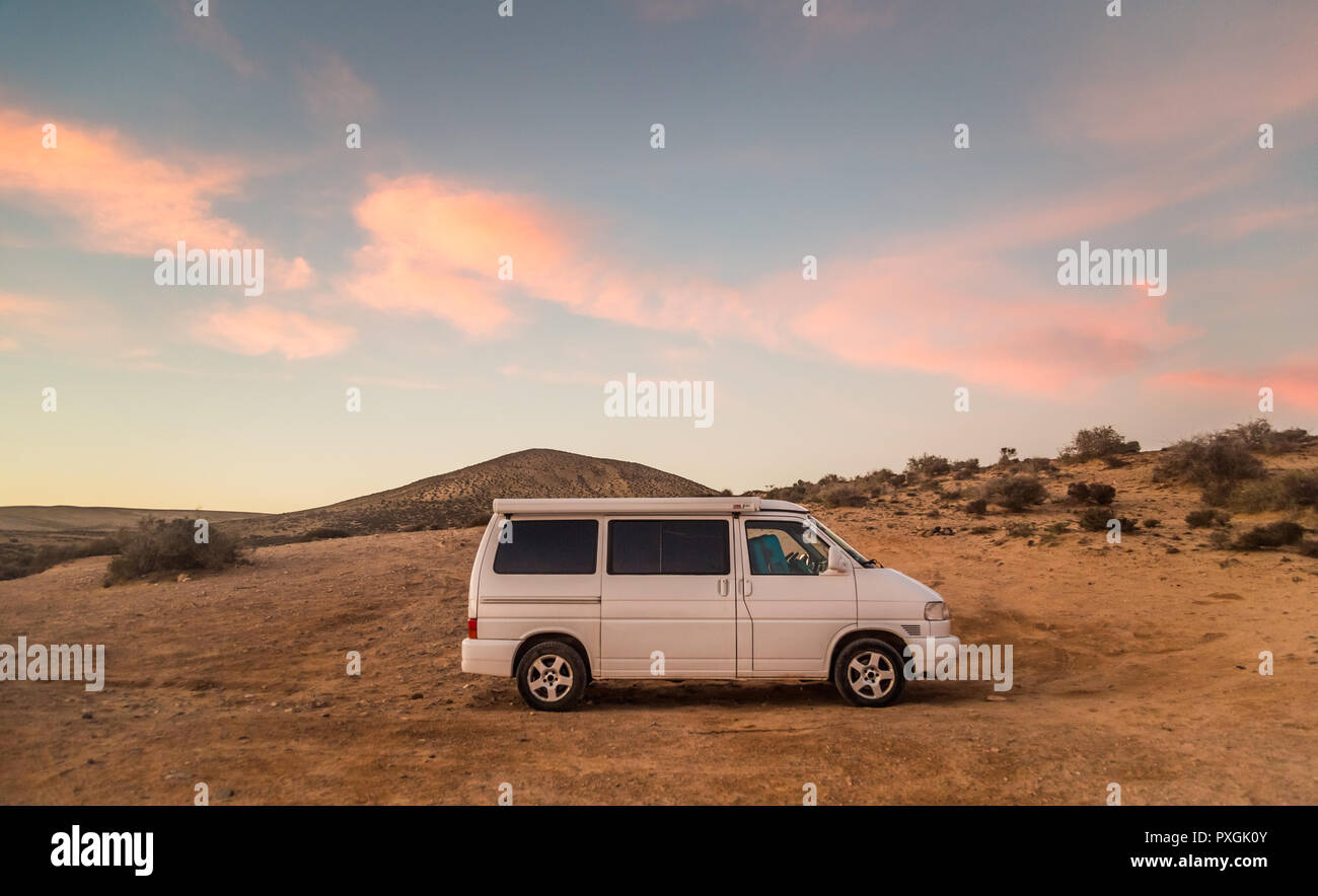 Family camper van parked on beach in Fuerteventura, Canary Islands, Spain. Stock Photo