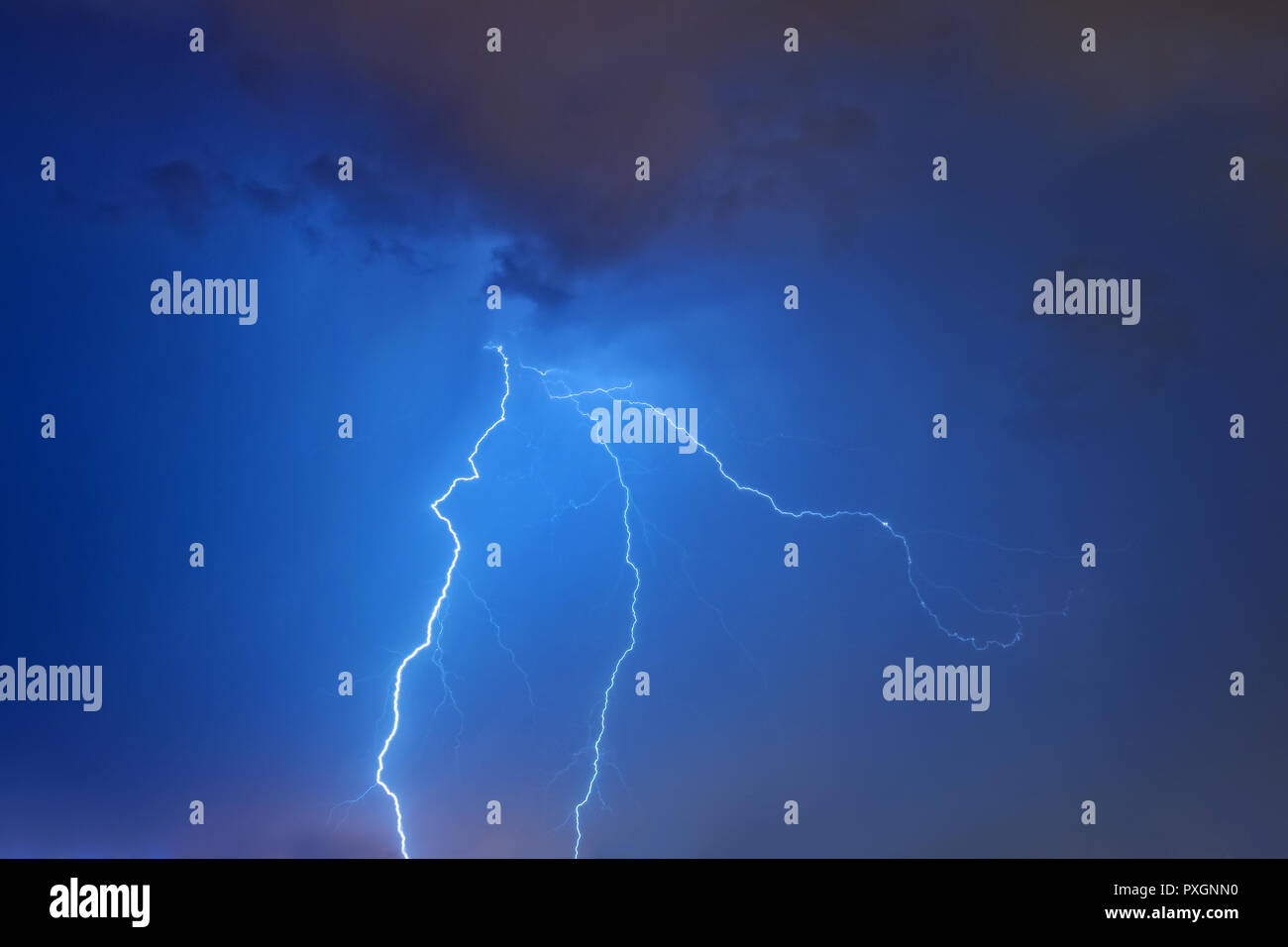 Lighting bolt on the blue night sky Stock Photo - Alamy