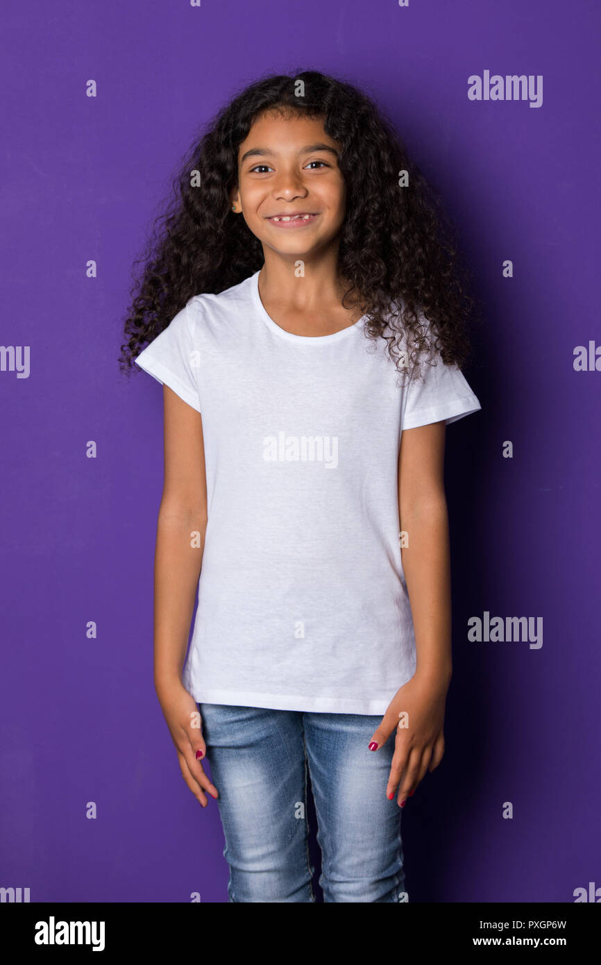 Little African American Girl With Long Curly Hair In A White T