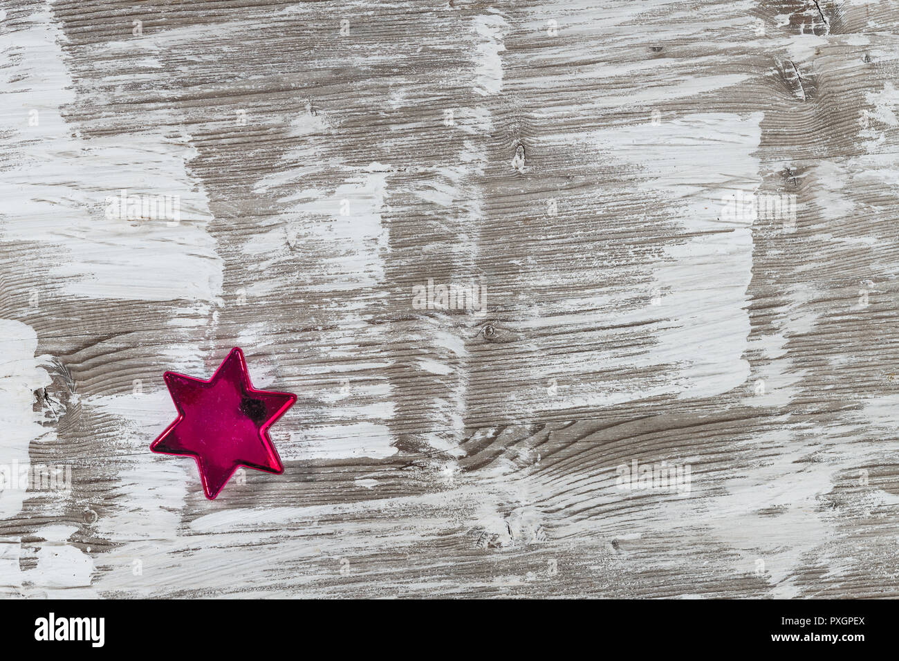 Christmas star on old wooden table Stock Photo